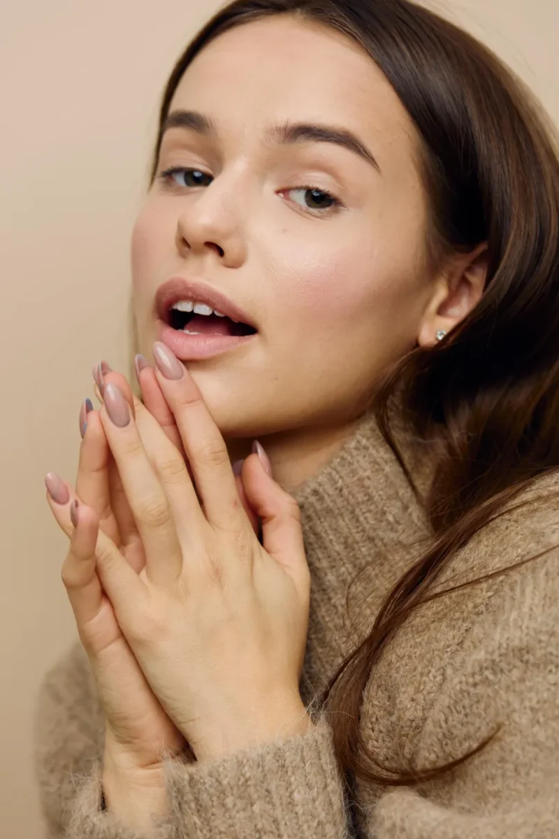 close up young woman with eyes closed